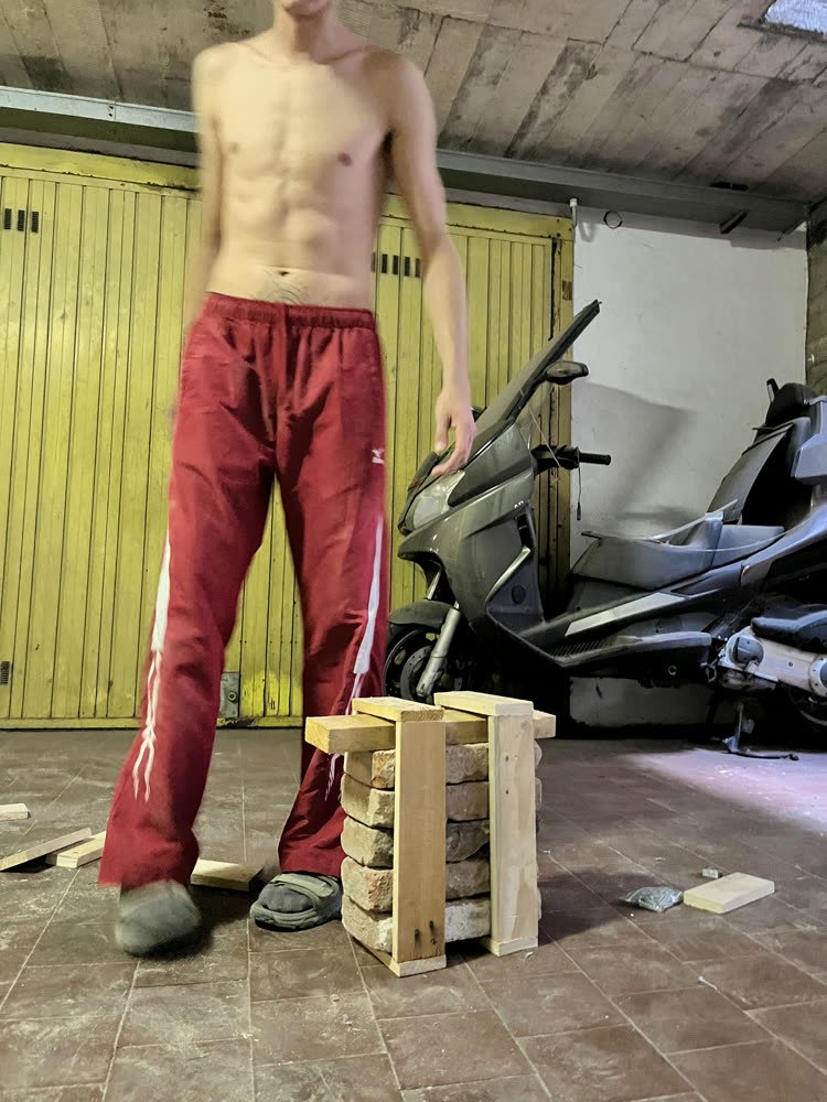 Carrying the pallet boards through the garage