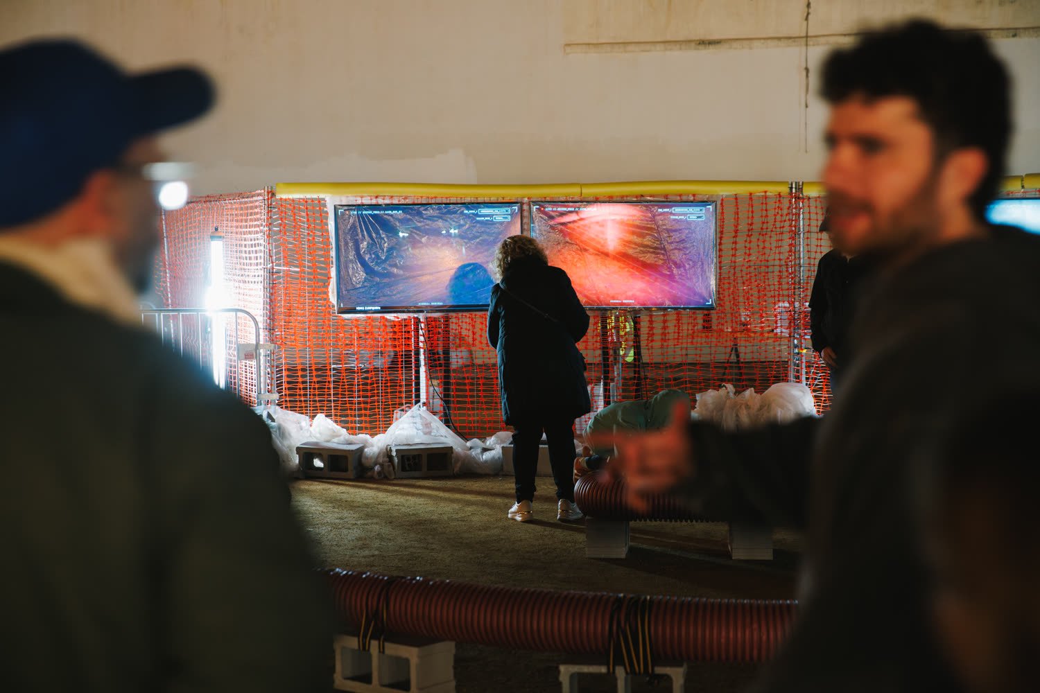 The excavation site at night, barriers, smoke and the light bar
