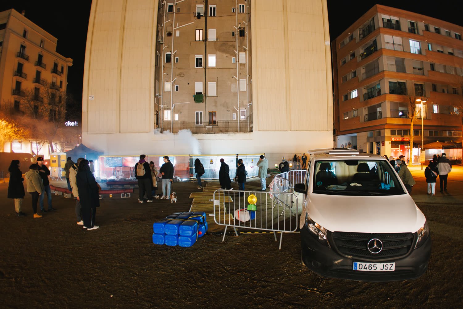 The excavation site at night, barriers, smoke and the light bar