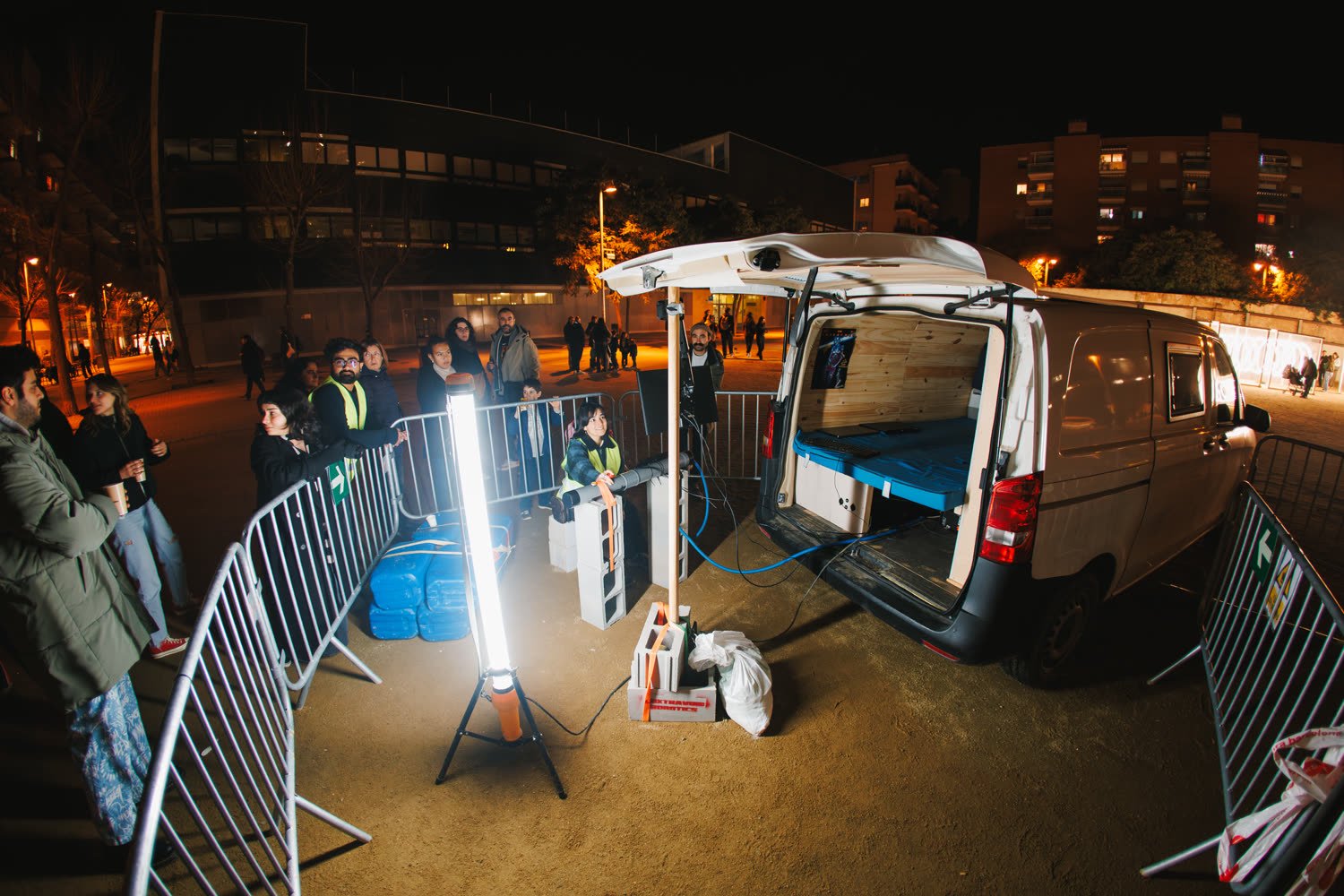 The excavation site at night, barriers, smoke and the light bar