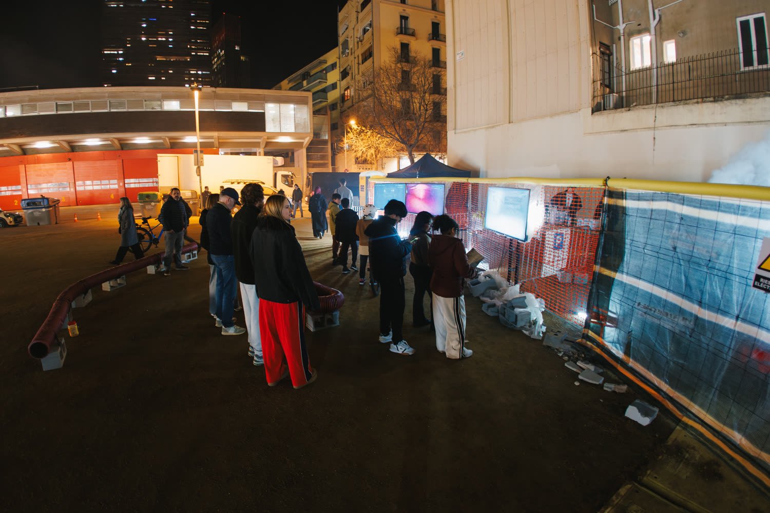 The excavation site at night, barriers, smoke and the light bar