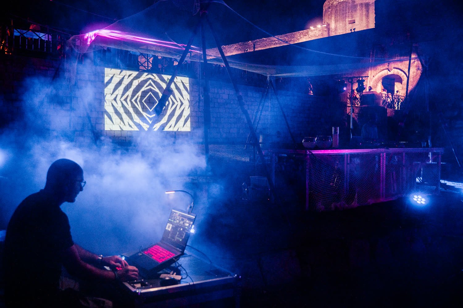 Smoke and light across the stage
