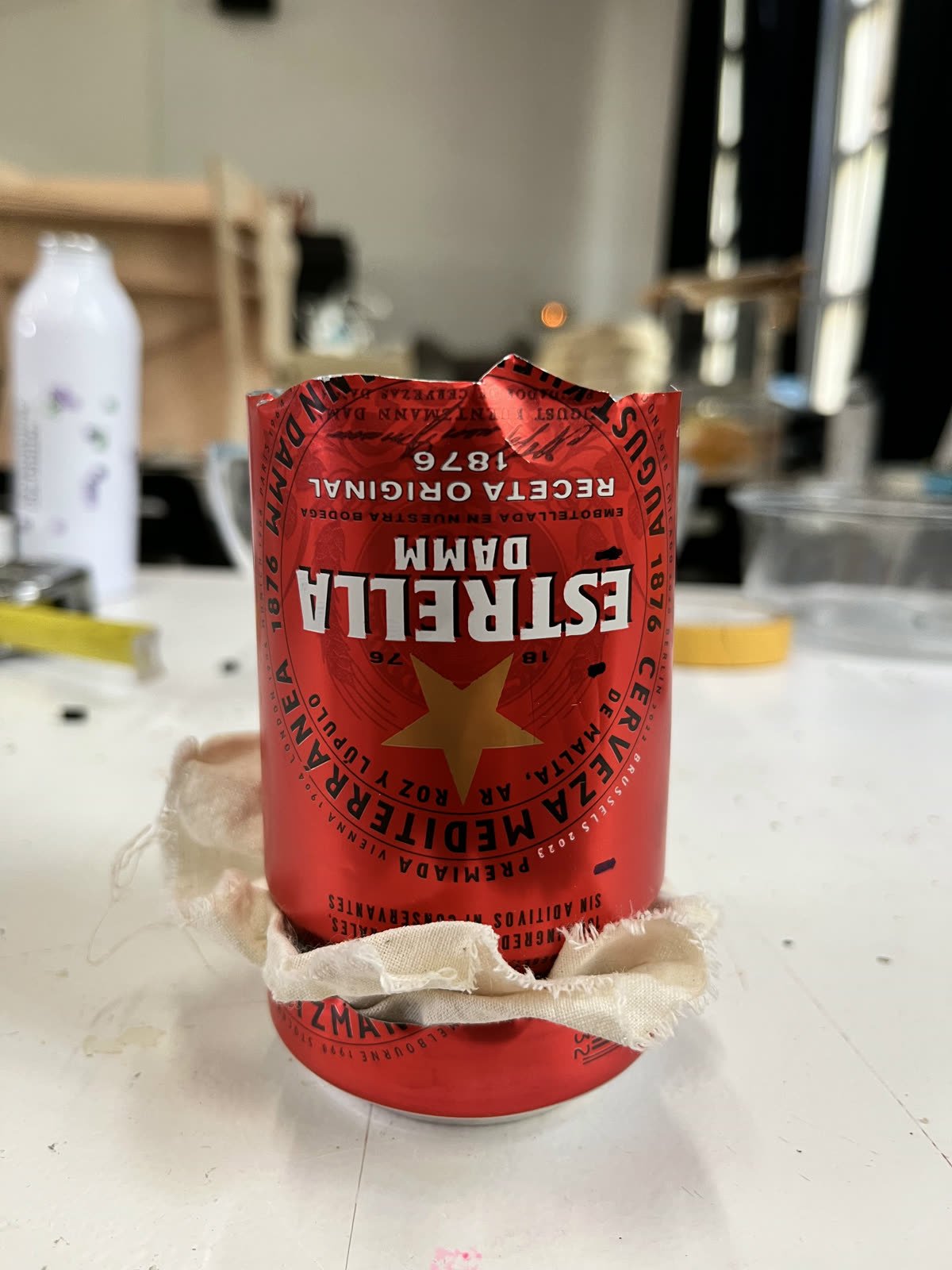 The beer-can filter, packed with fabric