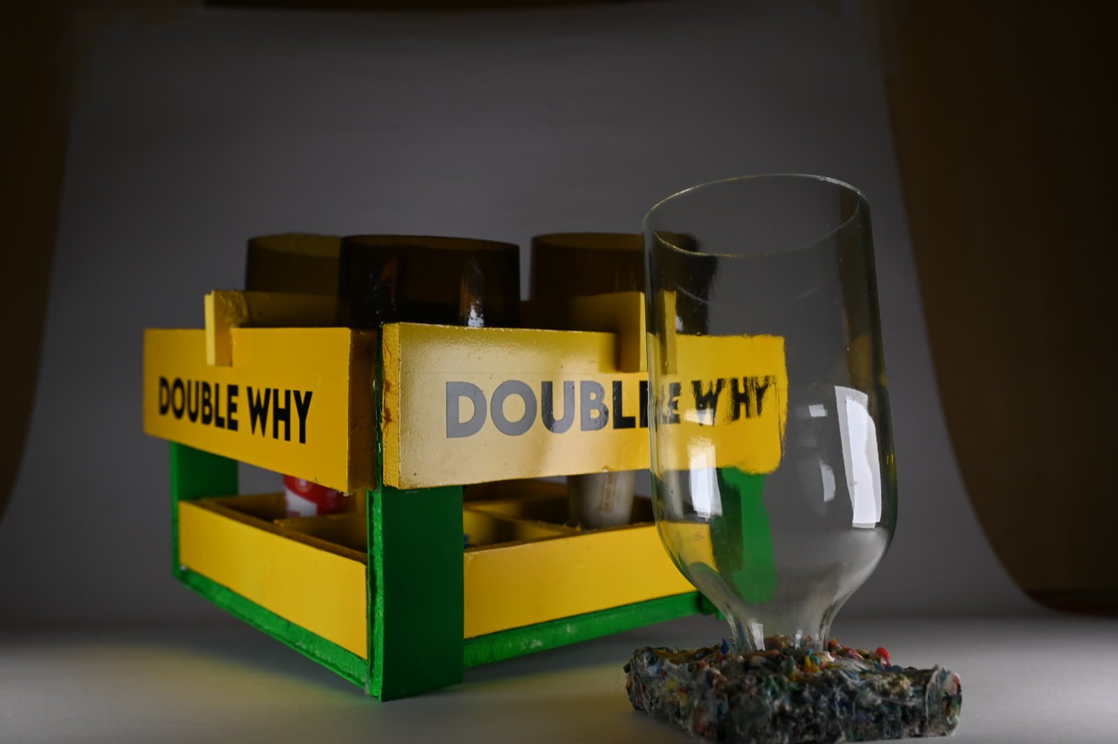 Objects moulded from glass and plastic waste