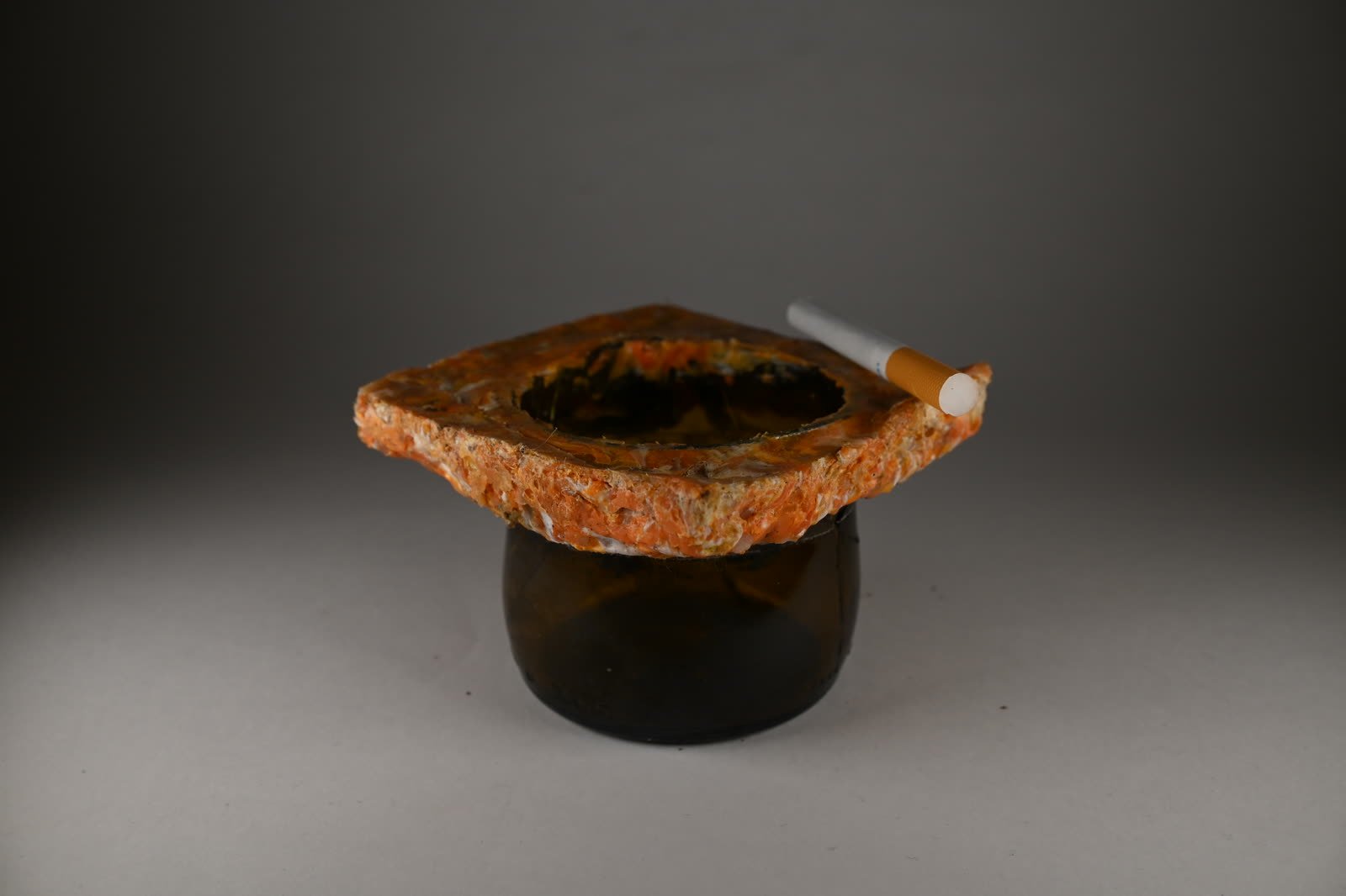 Objects moulded from glass and plastic waste