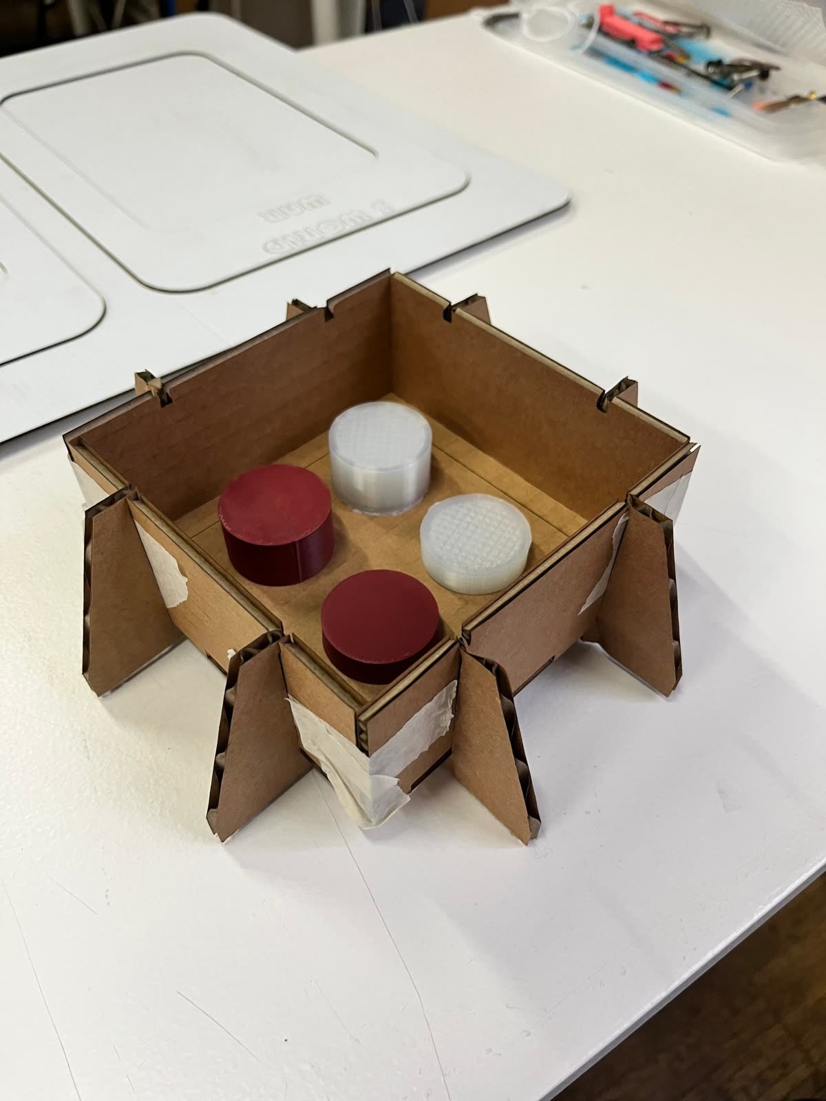 The SAVES ANIMAL board game and its pieces