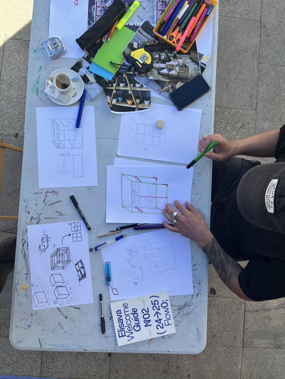 Sketching the shelf out on paper with the owners